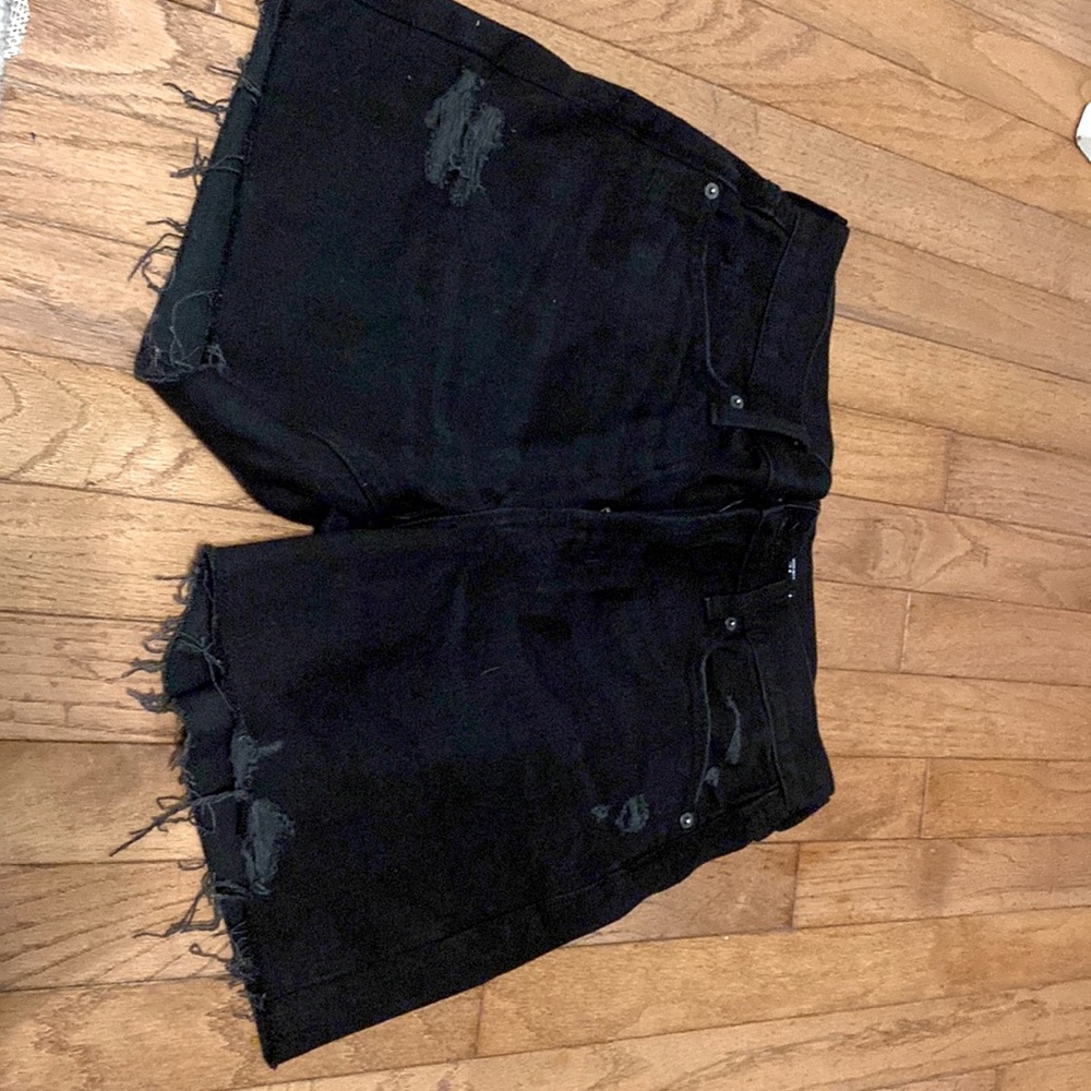 Black shorts . Size 4
